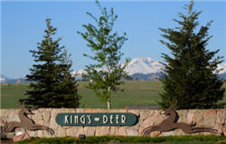 King's Deer entrance at County Line and Roller Coaster, with Pikes Peak in the background